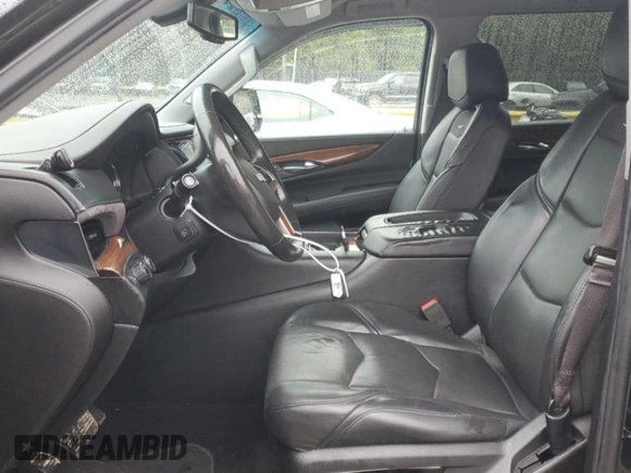 2017 Cadillac Escalade z VIN 1GYS4GKJ9HR142487, wystawiony jako Copart lot #73407214 z przebiegiem 178 710 mil mil oraz Szkoda całkowita • Salvage title. Historia ofert i sprzedaży dostępna na DreamBid. Obrazek 7.