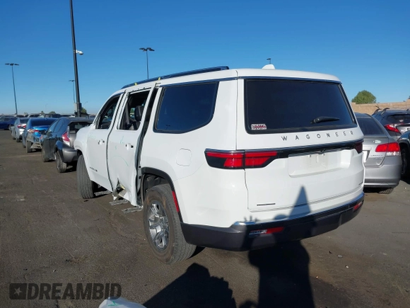 2022 Jeep Wagoneer Series I with VIN 1C4SJVAT8NS220302, listed as a IAAI auction lot 41297633 with 21,019 mi miles and . Bid and sale history available at DreamBid. Image 3.