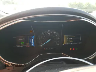 2016 Ford Fusion SE Hybrid z VIN 3FA6P0LU5GR377735, wystawiony jako Copart lot #58791955 z przebiegiem 135 798 mil mil oraz Szkoda całkowita • Salvage title. Historia ofert i sprzedaży dostępna na DreamBid. Obrazek 9.