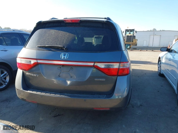 2013 Honda Odyssey Touring with VIN 5FNRL5H9XDB009973, listed as a IAAI auction lot 41904710 with 219,067 mi miles. Bid and sale history available at carsss.com. Image 16.