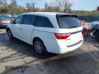 2011 Honda Odyssey EX-L with VIN 5FNRL5H6XBB059162, listed as a IAAI auction lot 42061378 with 164,317 mi miles and . Bid and sale history available at carsss.com. Image 3.