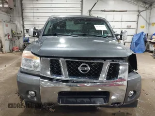 2014 Nissan Titan S with VIN 1N6AA0EC6EN513801, listed as a IAAI auction lot 41762295 with 128,412 mi miles and . Bid and sale history available at DreamBid. Image 12.