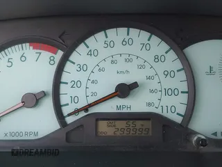 2004 Toyota Corolla CE with VIN JTDBR32E042025208, listed as a IAAI auction lot 41934485 with 299,999 mi miles. Bid and sale history available at carsss.com. Image 7.