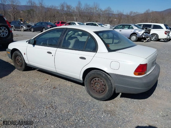 1999 Saturn SL with VIN 1G8ZH5282XZ178928, listed as a IAAI auction lot 41758412 with 249,418 mi miles. Bid and sale history available at carsss.com. Image 3.
