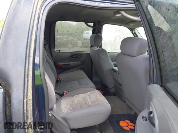 2003 Ford F-150 XLT with VIN 1FTRW076X3KC61967, listed as a IAAI auction lot 42016065 with 206,256 mi miles. Bid and sale history available at carsss.com. Image 8.
