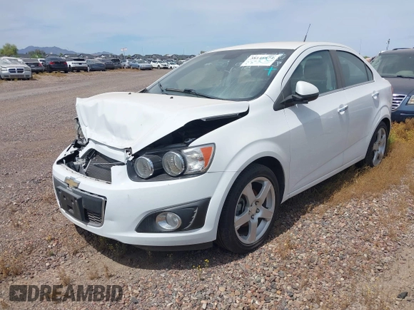 2014 Chevrolet Sonic LTZ with VIN 1G1JE5SB4E4227749, listed as a IAAI auction lot 38965556 with 69,550 mi miles. Bid and sale history available at carsss.com. Image 2.