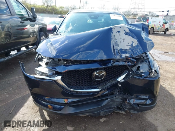 2018 Mazda CX-5 Touring with VIN JM3KFBCM5J0369799, listed as a IAAI auction lot 41895364 with 76,801 mi miles and . Bid and sale history available at carsss.com. Image 6.