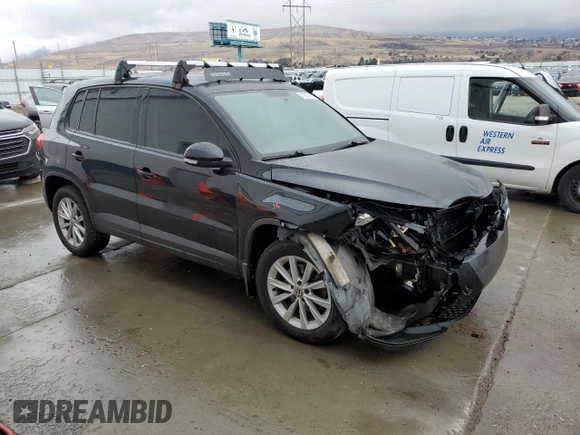 2017 Volkswagen Tiguan S with VIN WVGBV7AX8HK046105, listed as a Copart auction lot 47805145 with 128,900 mi miles and Salvage Title. Bid and sale history available at DreamBid. Image 4.
