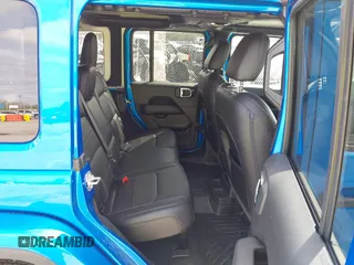 2023 Jeep Wrangler Sahara with VIN 1C4HJXEG4PW584800, listed as a IAAI auction lot 41908392 with 22,108 mi miles and . Bid and sale history available at DreamBid. Image 8.