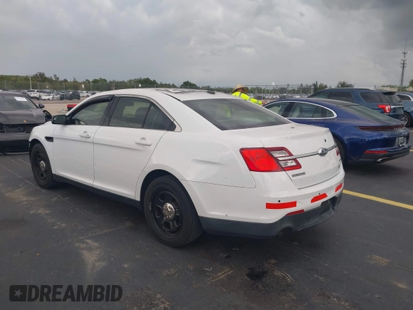 2015 Ford Police Interceptor with VIN 1FAHP2L83FG149326, listed as a IAAI auction lot 42477215 with 90,679 mi miles and . Bid and sale history available at DreamBid. Image 3.