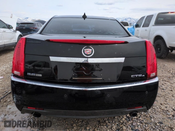 2009 Cadillac CTS AWD z VIN 1G6DT57V190103855, wystawiony jako Copart lot #50202255 z przebiegiem 249 540 mil mil oraz Szkoda całkowita • Salvage title. Historia ofert i sprzedaży dostępna na DreamBid. Obrazek 6.