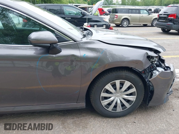 2019 Toyota Camry Hybrid LE z VIN 4T1B31HK4KU511360, wystawiony jako IAAI lot #42298260 z przebiegiem 133 019 mil mil oraz . Historia ofert i sprzedaży dostępna na DreamBid. Obrazek 19.
