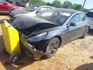 2019 Tesla Model 3 Long Range with VIN 5YJ3E1EB2KF510398, listed as a IAAI auction lot 42067654 with 108,971 mi miles and . Bid and sale history available at DreamBid. Image 16.
