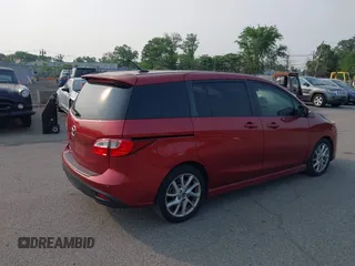 2014 Mazda 5 Grand Touring z VIN JM1CW2DL7E0166678, wystawiony jako IAAI lot #42438124 z przebiegiem 117 775 mil mil oraz . Historia ofert i sprzedaży dostępna na DreamBid. Obrazek 4.