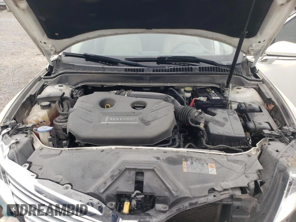 2013 Lincoln MKZ с VIN 3LN6L2G94DR811111, выставлен на аукционе Copart как лот 60800185 с пробегом 116 892 миль миль и Списание • Salvage title. История ставок и продаж доступна на DreamBid. Изображение 11.