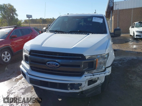 2018 Ford F-150 XL with VIN 1FTEW1EG1JKE29623, listed as a IAAI auction lot 40615703 with 122,846 mi miles and . Bid and sale history available at DreamBid. Image 12.