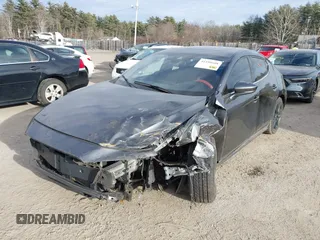 2021 Mazda 3 Premium with VIN JM1BPAML2M1310374, listed as a IAAI auction lot 41190608 with 97,648 mi miles. Bid and sale history available at carsss.com. Image 2.