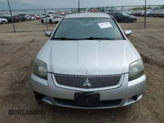 2011 Mitsubishi Galant FE z VIN 4A32B2FF4BE024234, wystawiony jako IAAI lot #42077967 z przebiegiem 144 682 mil mil oraz . Historia ofert i sprzedaży dostępna na DreamBid. Obrazek 12.