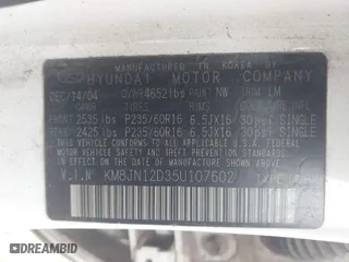2005 Hyundai Tucson GLS with VIN KM8JN12D35U107602, listed as a IAAI auction lot 41312611 with 121,615 mi miles. Bid and sale history available at carsss.com. Image 9.