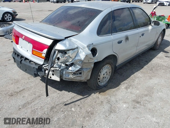 2002 Saturn LS z VIN 1G8JS54F92Y595651, wystawiony jako IAAI lot #41569902 z przebiegiem Nie podano mil oraz . Historia ofert i sprzedaży dostępna na DreamBid. Obrazek 12.