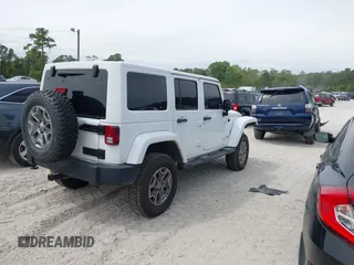 2015 Jeep Wrangler Unlimited Rubicon Hard Rock с VIN 1C4HJWFG7FL684057, выставлен на аукционе IAAI как лот 41963885 с пробегом 103 240 миль миль и . История ставок и продаж доступна на DreamBid. Изображение 4.