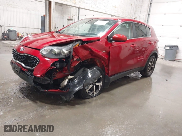 2020 Kia Sportage LX with VIN KNDPMCAC7L7809195, listed as a IAAI auction lot 41976306 with 59,648 mi miles. Bid and sale history available at carsss.com. Image 2.