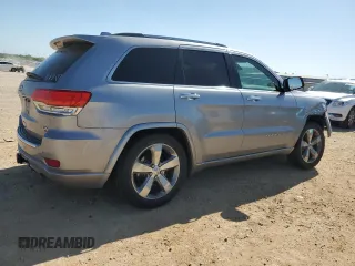 2014 Jeep Grand Cherokee Overland with VIN 1C4RJFCG7EC153156, listed as a Copart auction lot 52452925 with 152,348 mi miles and Salvage Title. Bid and sale history available at DreamBid. Image 3.
