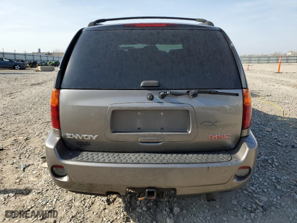 2005 GMC Envoy Denali with VIN 1GKET63M652379567, listed as a Copart auction lot 77862334 with 246,345 mi miles and Non Repairable. Bid and sale history available at carsss.com. Image 6.