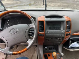 2006 Lexus GX 470 z VIN JTJBT20X960124511, wystawiony jako Copart lot #56307145 z przebiegiem 190 309 mil mil oraz Tytuł czysty. Historia ofert i sprzedaży dostępna na DreamBid. Obrazek 7.