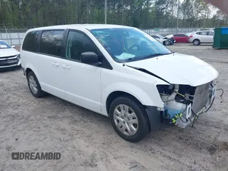2018 Dodge Grand Caravan SE Plus with VIN 2C4RDGBGXJR163986, listed as a IAAI auction lot 41933618 with 98,297 mi miles and . Bid and sale history available at DreamBid. Image 1.