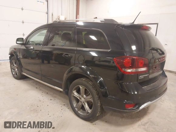 2014 Dodge Journey Crossroad with VIN 3C4PDDGG4ET311521, listed as a IAAI auction lot 41867464 with 128,647 mi miles and . Bid and sale history available at DreamBid. Image 3.