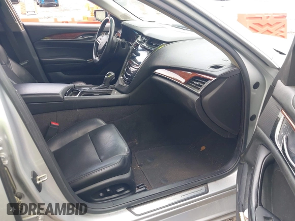 2014 Cadillac CTS Luxury RWD z VIN 1G6AR5S38E0173628, wystawiony jako IAAI lot #42343647 z przebiegiem 166 035 mil mil oraz . Historia ofert i sprzedaży dostępna na DreamBid. Obrazek 5.