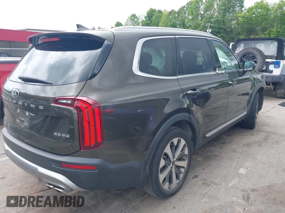 2020 Kia Telluride EX with VIN 5XYP34HC3LG088925, listed as a IAAI auction lot 42399123 with 30,106 mi miles and . Bid and sale history available at DreamBid. Image 4.