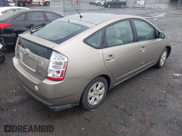 2006 Toyota Prius z VIN JTDKB20U067517414, wystawiony jako IAAI lot #42251158 z przebiegiem 233 266 mil mil oraz . Historia ofert i sprzedaży dostępna na DreamBid. Obrazek 4.
