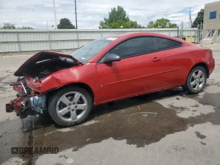 2006 Pontiac G6 GT with VIN 1G2ZH158664144243, listed as a Copart auction lot 57622335 with 104,684 mi miles and Salvage title. Bid and sale history available at DreamBid. Image 1.