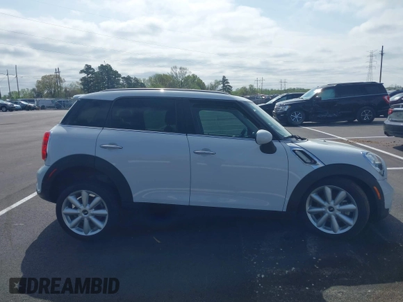2016 MINI Countryman S with VIN WMWZC3C51GWT10458, listed as a IAAI auction lot 41878799 with 112,019 mi miles and . Bid and sale history available at DreamBid. Image 13.