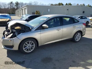 2018 Ford Focus SE with VIN 1FADP3F23JL219189, listed as a Copart auction lot 52209335 with 101,180 mi miles and Salvage title. Bid and sale history available at DreamBid. Image 1.