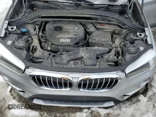 2018 BMW X1 sDrive28i with VIN WBXHU7C32J5H44215, listed as a Copart auction lot 87356474 with 121,828 mi miles and Salvage Title. Bid and sale history available at carsss.com. Image 12.