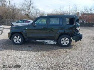 2011 Jeep Liberty Sport 70th Anniversary with VIN 1J4PN2GK4BW560391, listed as a IAAI auction lot 41918406 with 133,391 mi miles. Bid and sale history available at carsss.com. Image 14.
