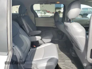 2021 Toyota Sienna LE z VIN 5TDKRKEC4MS028772, wystawiony jako Copart lot #55316275 z przebiegiem 93 840 mil mil oraz Szkoda całkowita • Salvage title. Historia ofert i sprzedaży dostępna na DreamBid. Obrazek 11.