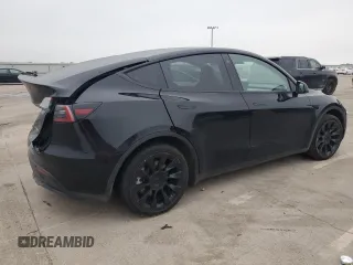 2022 Tesla Model Y Long Range with VIN 7SAYGAEE1NF381491, listed as a Copart auction lot 52694185 with 33,412 mi miles and Salvage Title. Bid and sale history available at DreamBid. Image 3.