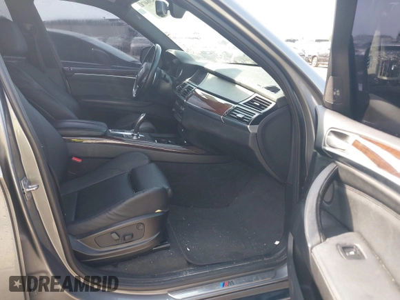 2012 BMW X5 50i with VIN 5UXZV8C56CL426081, listed as a IAAI auction lot 42084071 with 135,473 mi miles and . Bid and sale history available at DreamBid. Image 5.