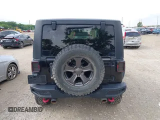 2018 Jeep Wrangler Rubicon Recon with VIN 1C4BJWCG6JL814834, listed as a IAAI auction lot 42327297 with 59,623 mi miles and . Bid and sale history available at DreamBid. Image 16.