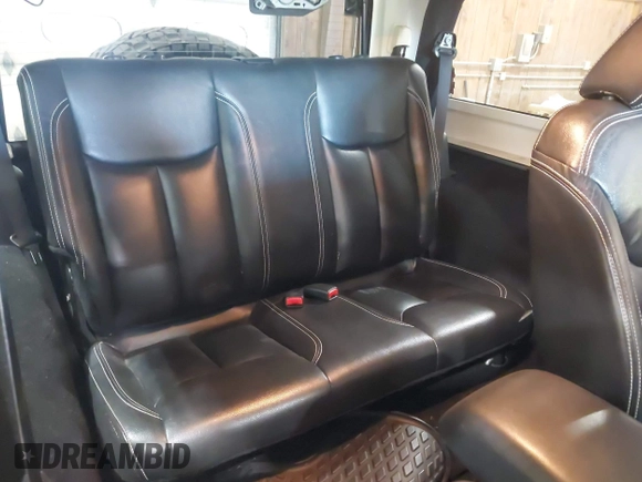 2014 Jeep Wrangler Sport with VIN 1C4AJWAG0EL173362, listed as a IAAI auction lot 42231863 with 99,321 mi miles and . Bid and sale history available at DreamBid. Image 8.