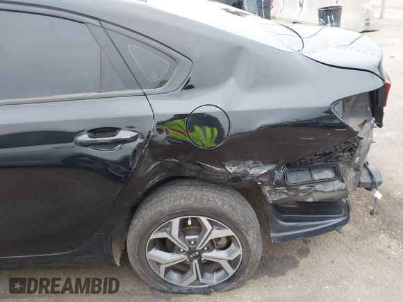 2021 Kia Forte LXS z VIN 3KPF24AD8ME284245, wystawiony jako IAAI lot #42451746 z przebiegiem 56 975 mil mil oraz . Historia ofert i sprzedaży dostępna na DreamBid. Obrazek 6.