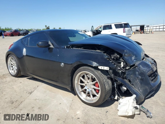 2013 Nissan 370Z Touring z VIN JN1AZ4EH4DM881576, wystawiony jako Copart lot #50645635 z przebiegiem 123 515 mil mil oraz Szkoda całkowita • Salvage title. Historia ofert i sprzedaży dostępna na DreamBid. Obrazek 4.