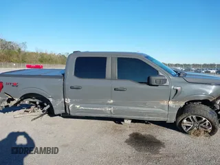 2021 Ford F-150 XL z VIN 1FTEW1EP3MKE33600, wystawiony jako IAAI lot #41053750 z przebiegiem 140 085 mil mil oraz . Historia ofert i sprzedaży dostępna na DreamBid. Obrazek 13.