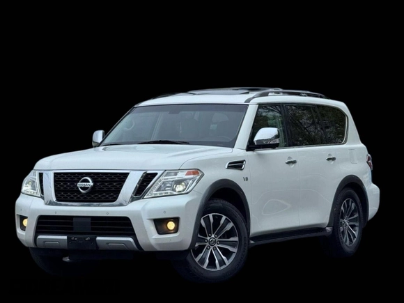 2017 Nissan Armada SV z VIN JN8AY2NC7H95049XX, wystawiony jako Copart lot #61907525 z przebiegiem 131 364 mil mil oraz Czysty tytuł • Clean title. Historia ofert i sprzedaży dostępna na DreamBid. Obrazek 2.