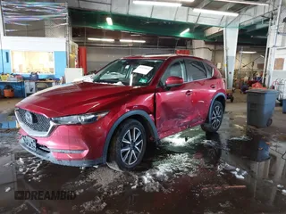 2018 Mazda CX-5 Touring with VIN JM3KFBCM7J0430425, listed as a IAAI auction lot 41524553 with 102,715 mi miles. Bid and sale history available at carsss.com. Image 16.