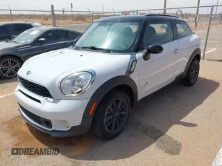 2013 MINI Paceman S ALL4 with VIN WMWSS7C51DWN51802, listed as a IAAI auction lot 41885786 with 96,386 mi miles and . Bid and sale history available at DreamBid. Image 17.